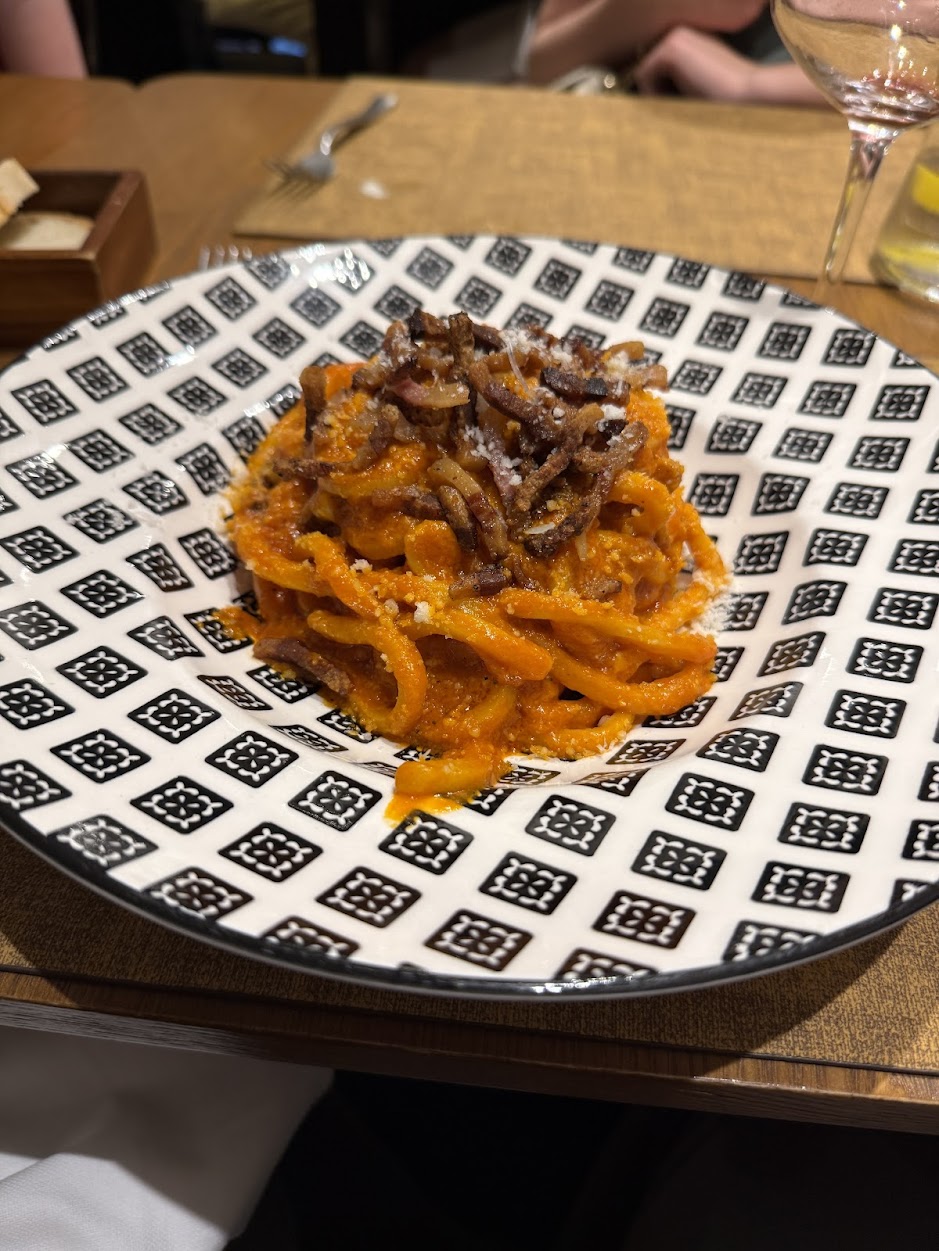 Amatriciana at EVO Hosteria, on one of their signature patterned plates.