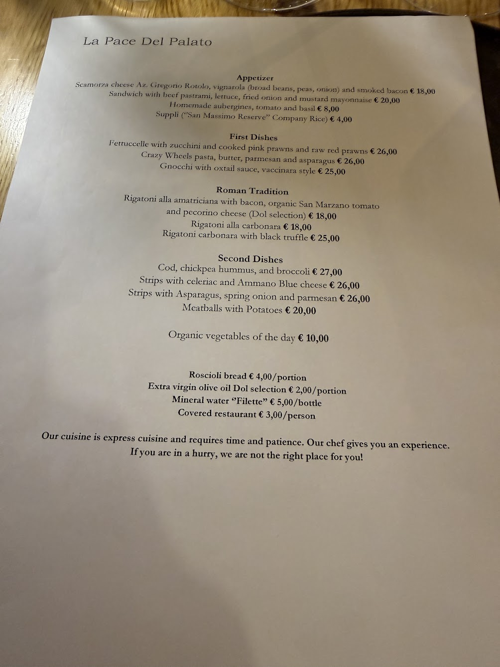 The menu at La Pace del Palato. Read the bottom.