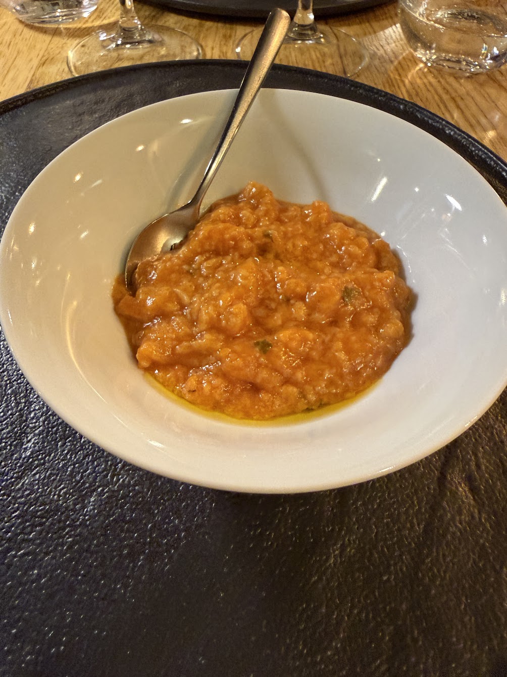 The chef's opening gift. Tomato and bread, olive oil. Not on the menu.