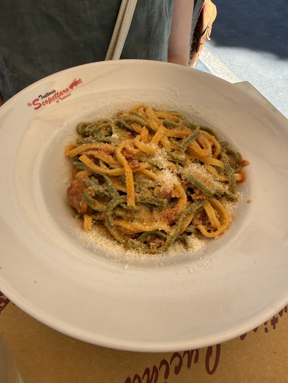 Fettuccine paglia e fieno al ragù di salsiccia at Lo Scopettaro. €11.