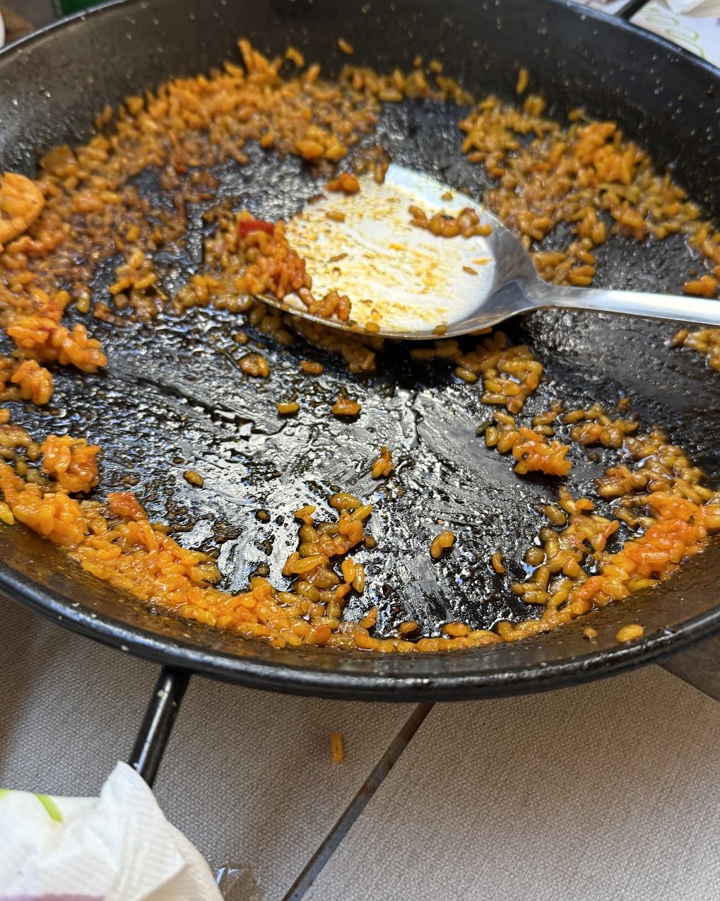 The crusty bits at the bottom of the pan. Worth the 40-minute wait.